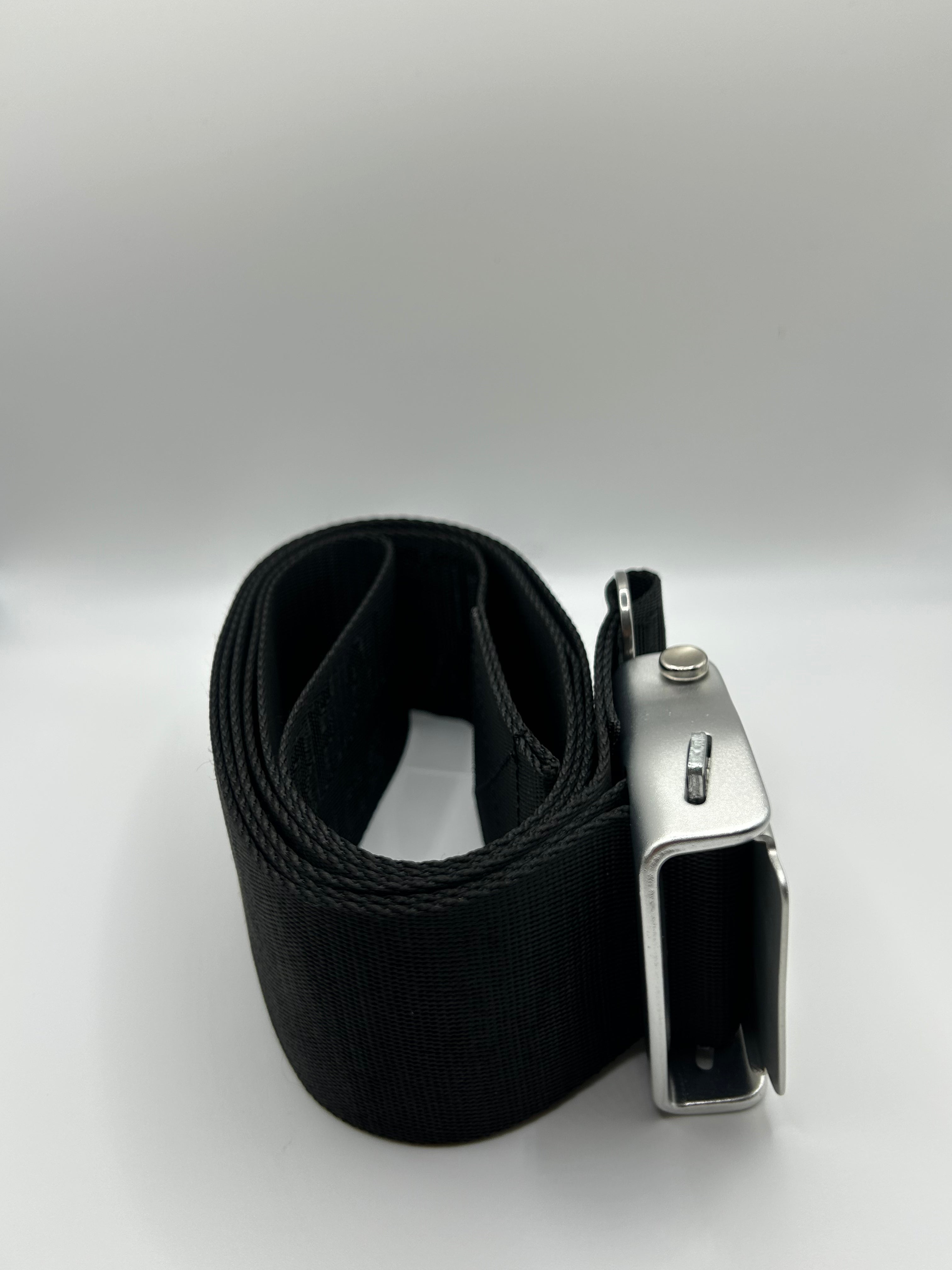 Gym seatbelt used on a leg extension machine